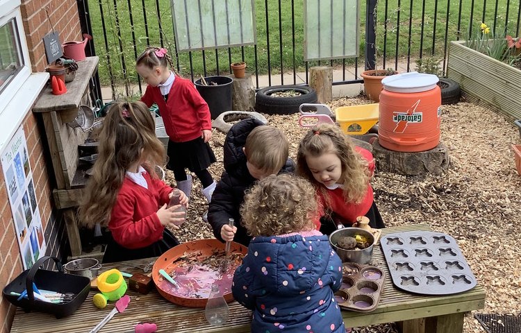 Image of Fun in the mud kitchen! 