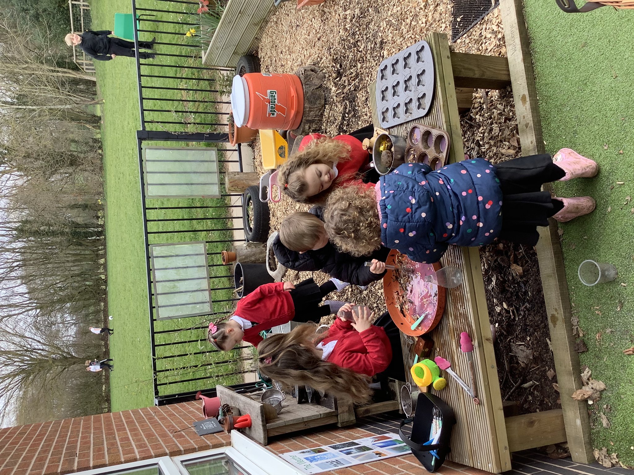 Image of Fun in the mud kitchen! 