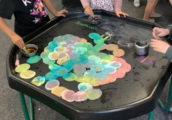 Image of Creating a colourful butterfly as a team!
