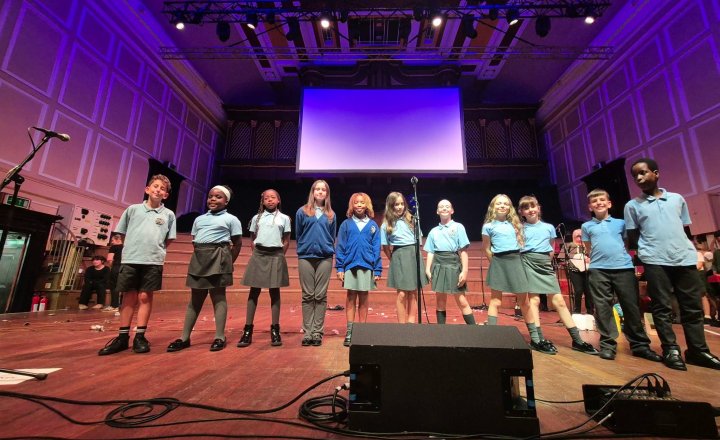 Pupils on stage at the City Hall for No More Sleeping