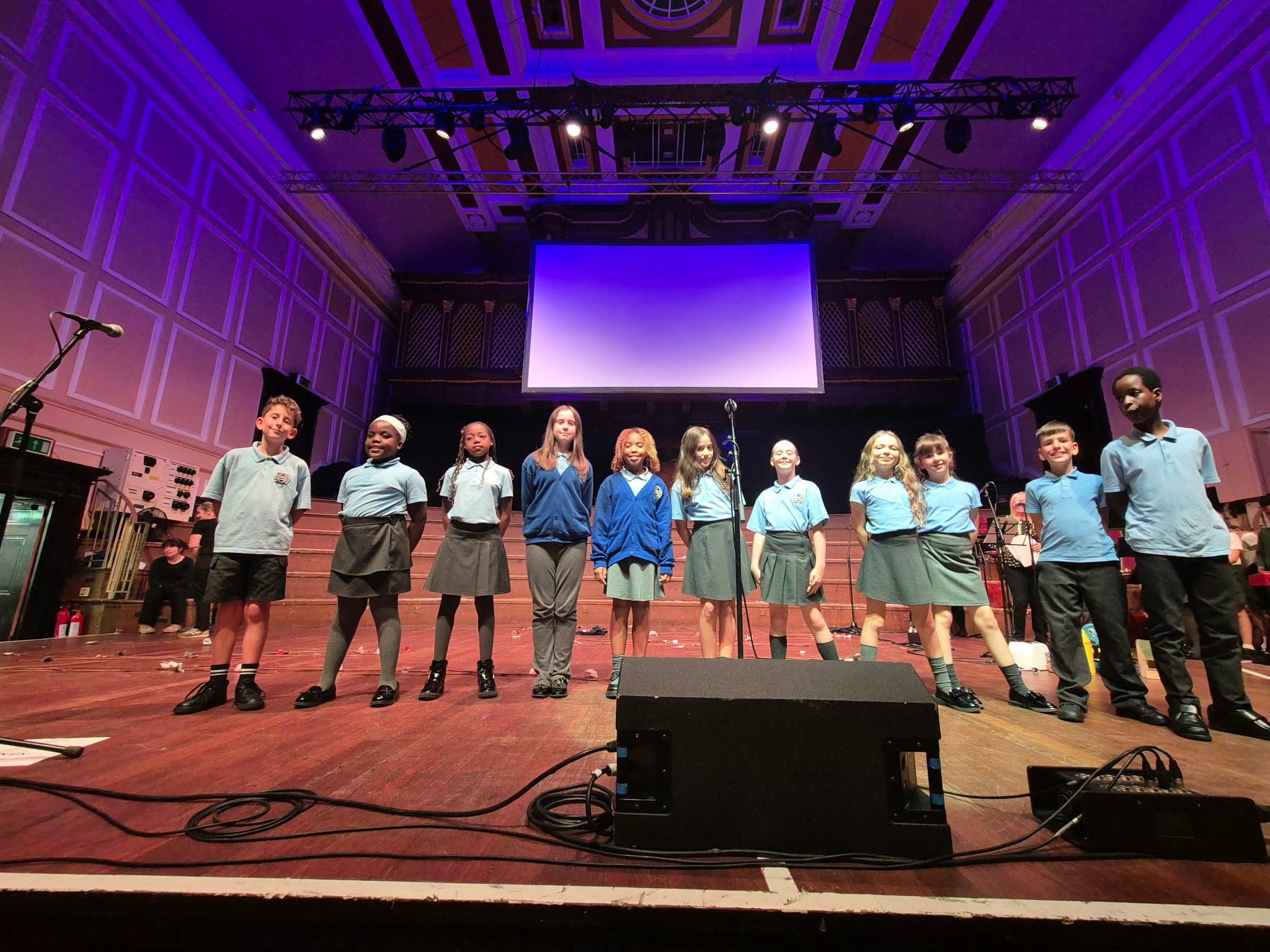 Pupils on stage at the City Hall for No More Sleeping