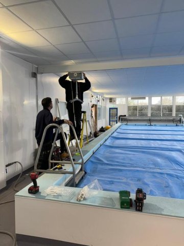 Reinstalling the pool hoist for accessibility