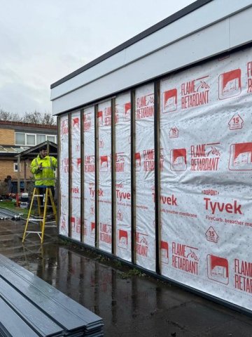 Old cladding removed, new insulation and frames added ready to clad.
