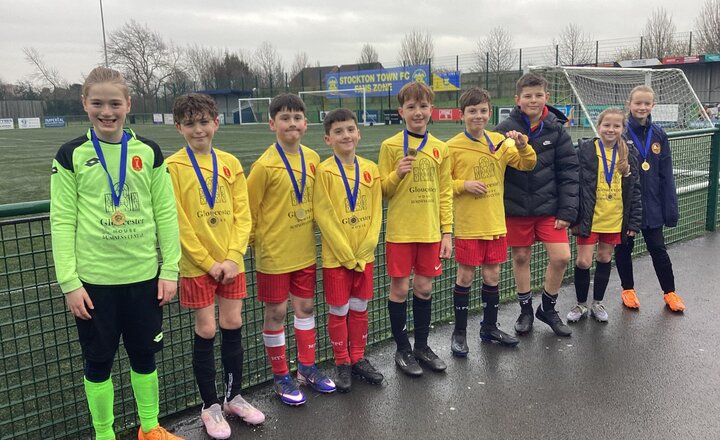 Image of Team Spirit Shines as Our Footballers Bring Home Gold