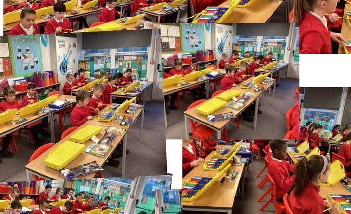 pupils experimenting with rhythm and melody on the xylophones