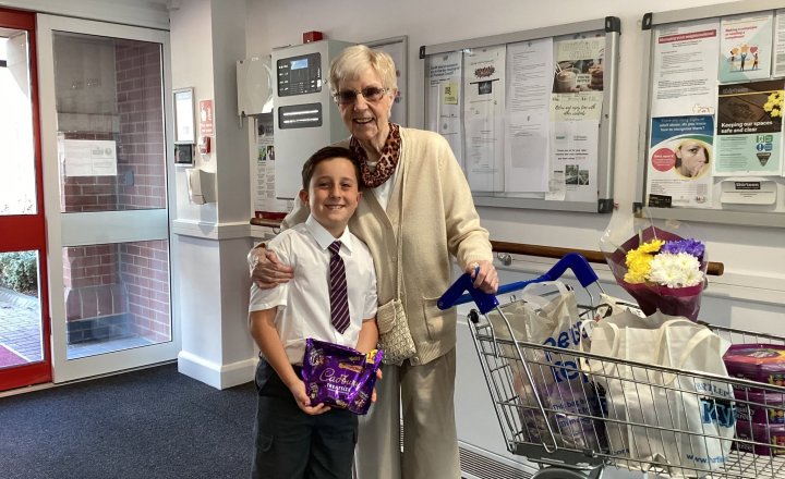 St Teresa's pupil spreading joy and kindness to their local community by donating flowers and gifts to mark St Teresa's Feast Day