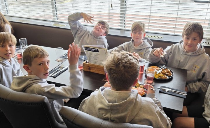 St Teresa's Year 6 children celebrating with a meal after their hard work in SATs 
