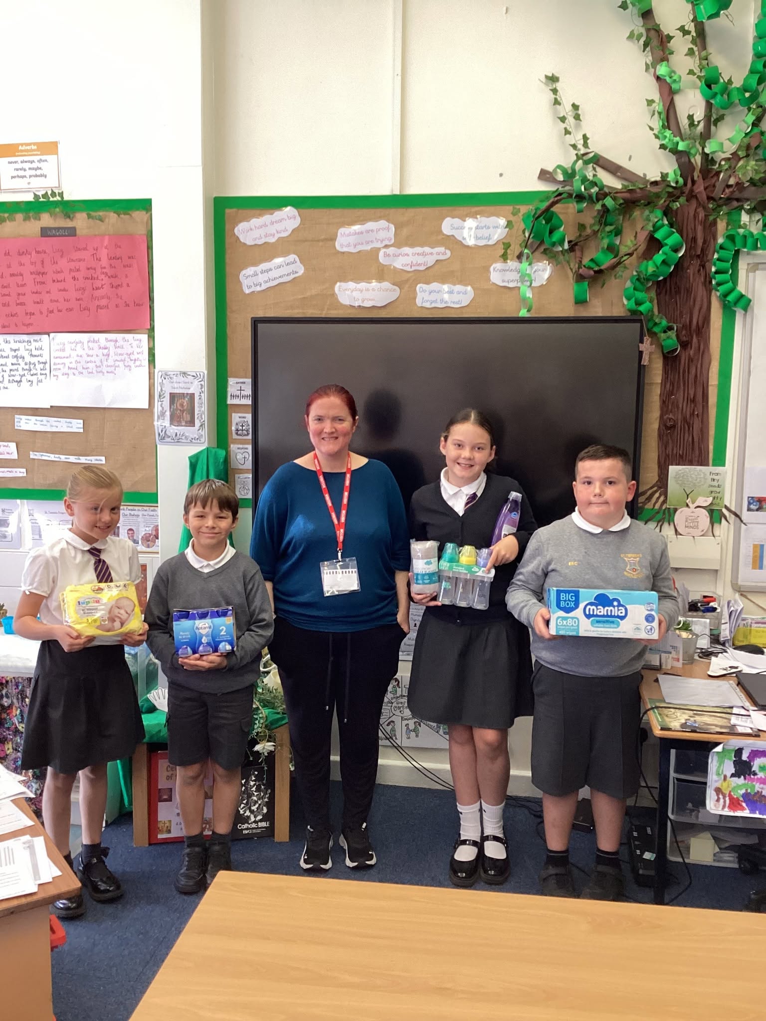 St Teresa's pupils meet Emily from Hartlepool Bank Bank, to learn about the support they provide to the local community