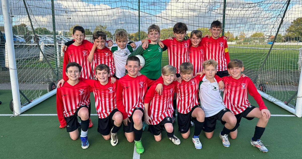 Y7 Football Team are "Champions of Wigan" St Edmund Arrowsmith