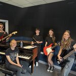 Image of Y8 students perform at 'RigFest' - future Glasto headliners perhaps?!