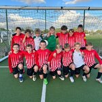 Image of Y7 Football Team are "Champions of Wigan"