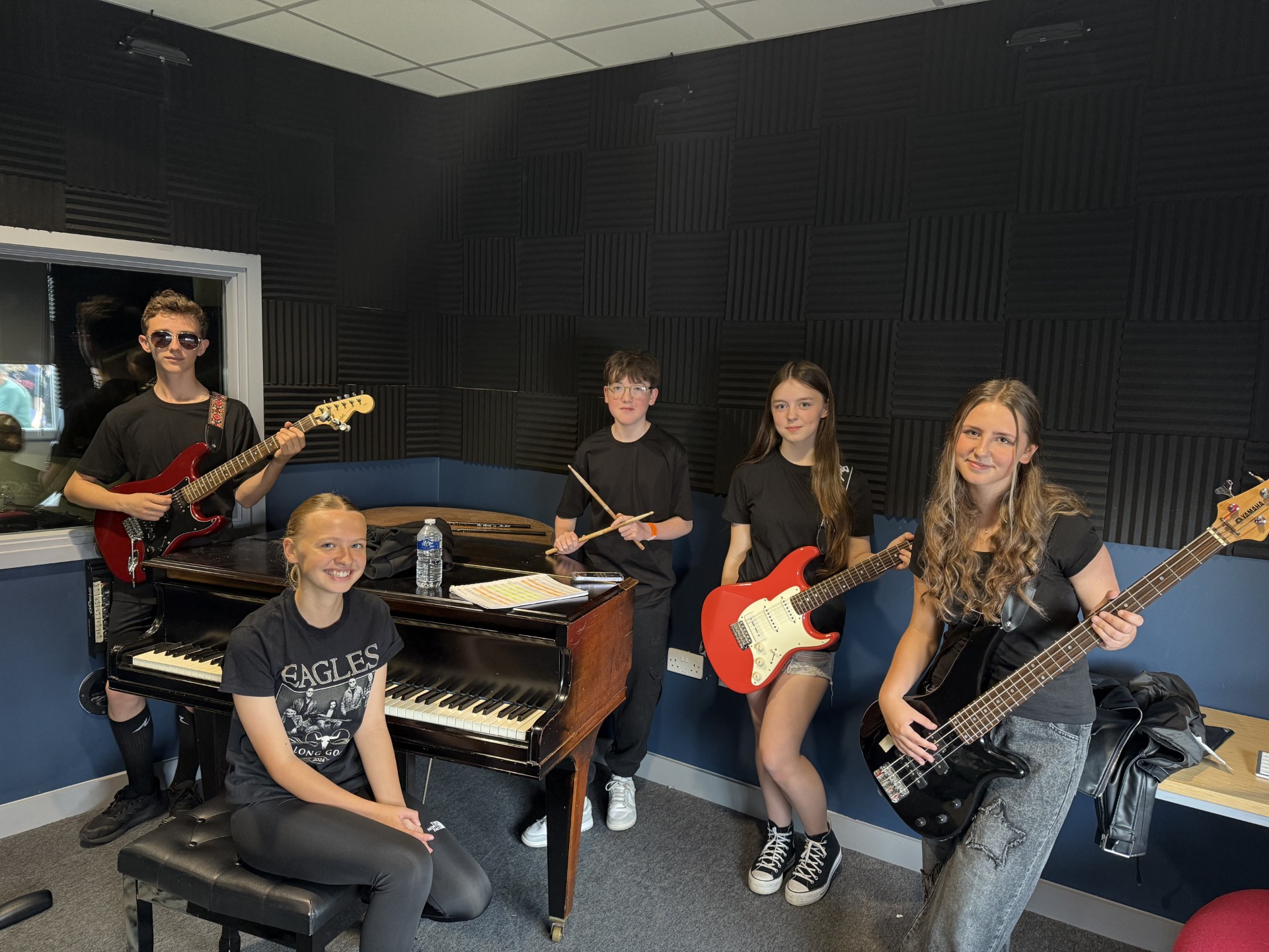 Image of Y8 students perform at 'RigFest' - future Glasto headliners perhaps?!
