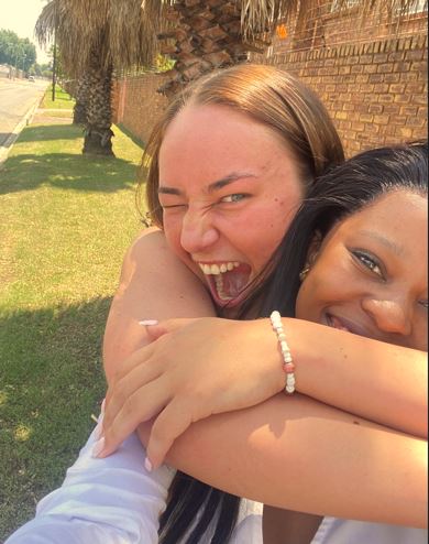 Image of Ex-student Olivia Tyrer returns to Soweto to visit her Penpal, Angel!