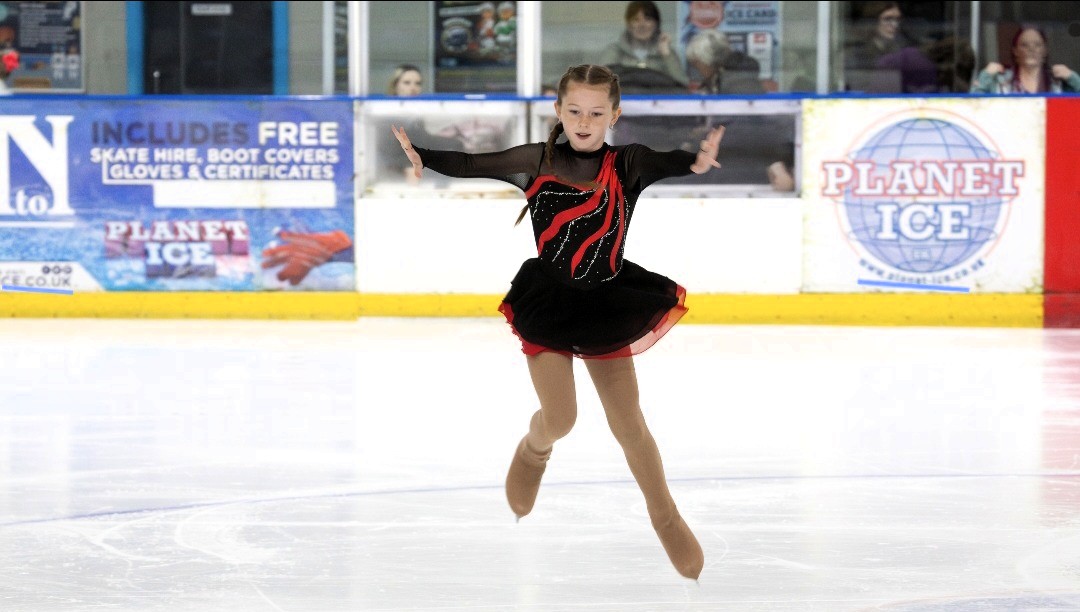 Image of Y7 student, Jessica skates in Dick Wittington on Ice