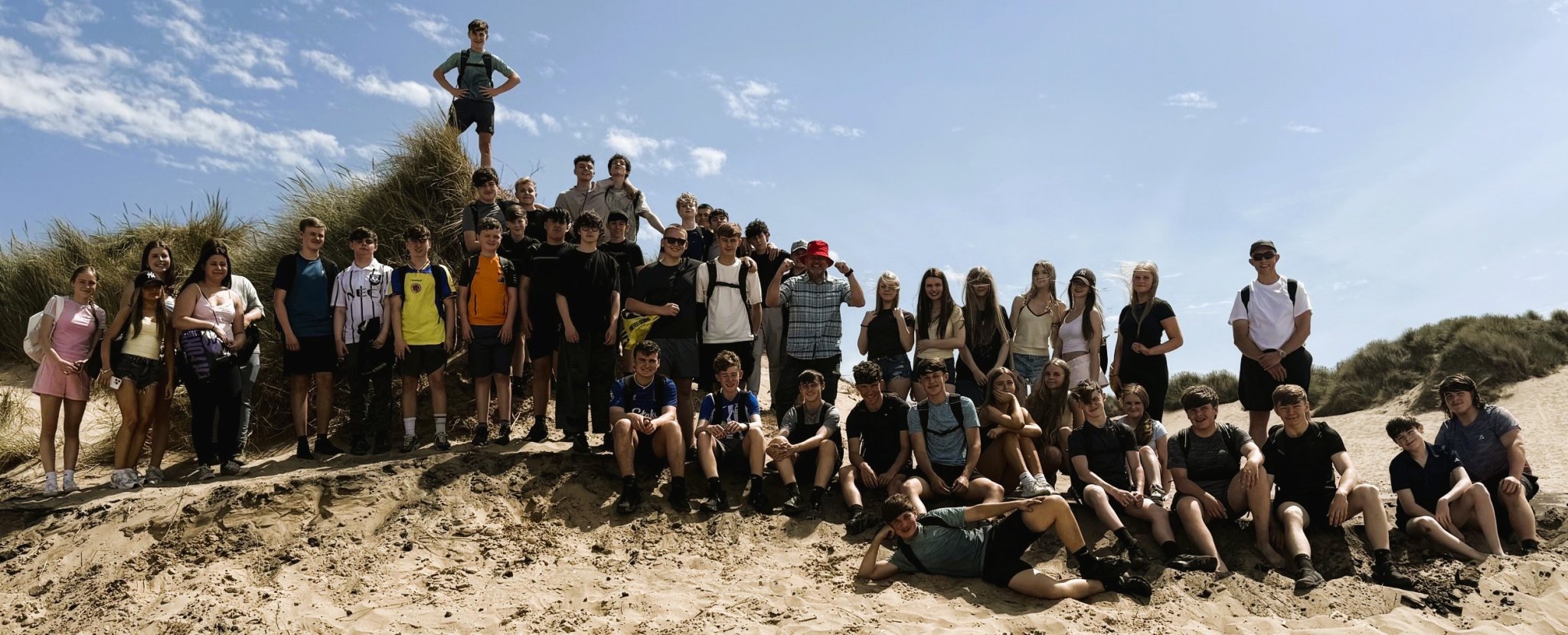 Image of Y10 GCSE Geography Students enjoy their field trip at Formby