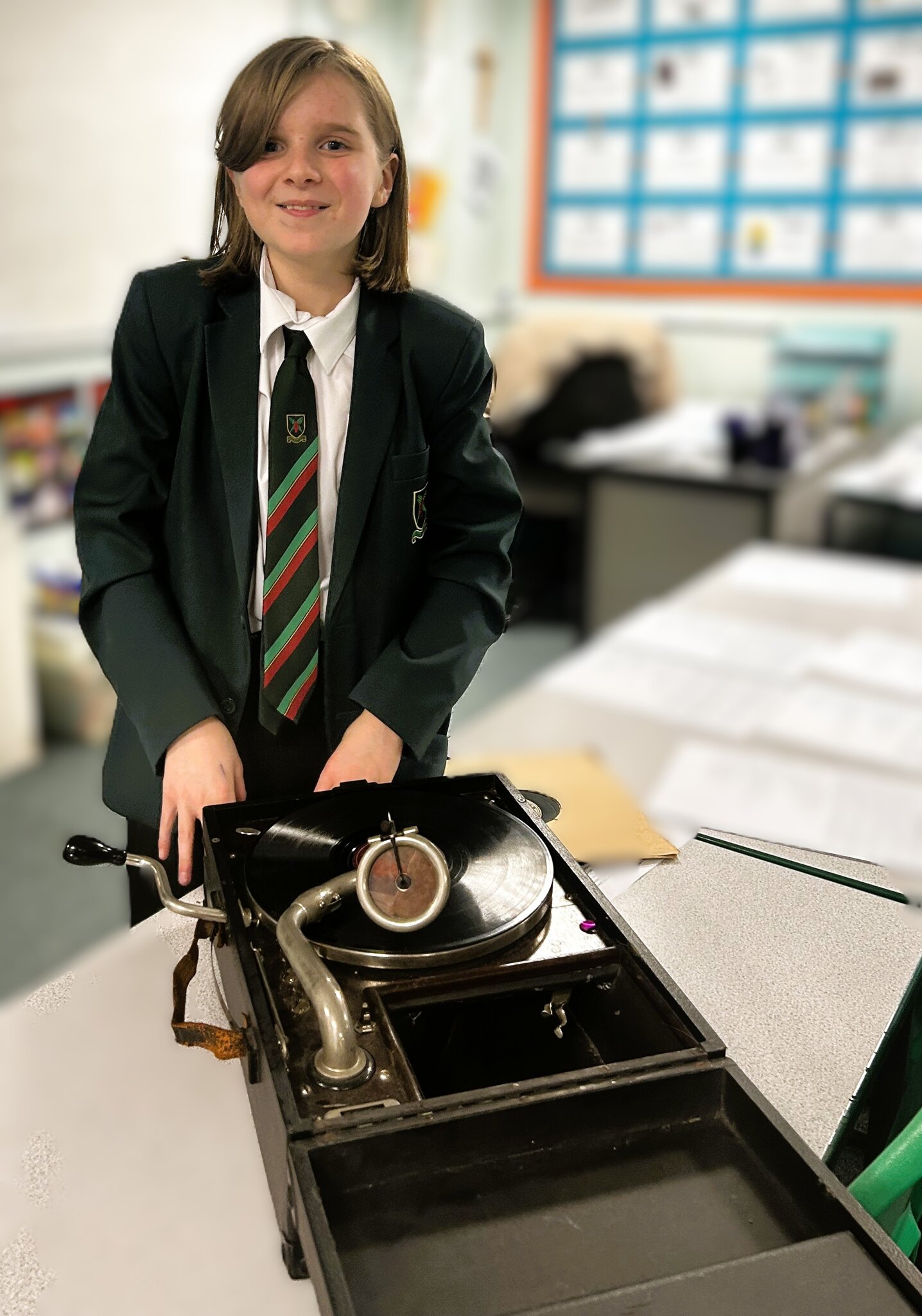 Image of Y8 student, Leo brings his 100 year-old grammar phone into his history lesson