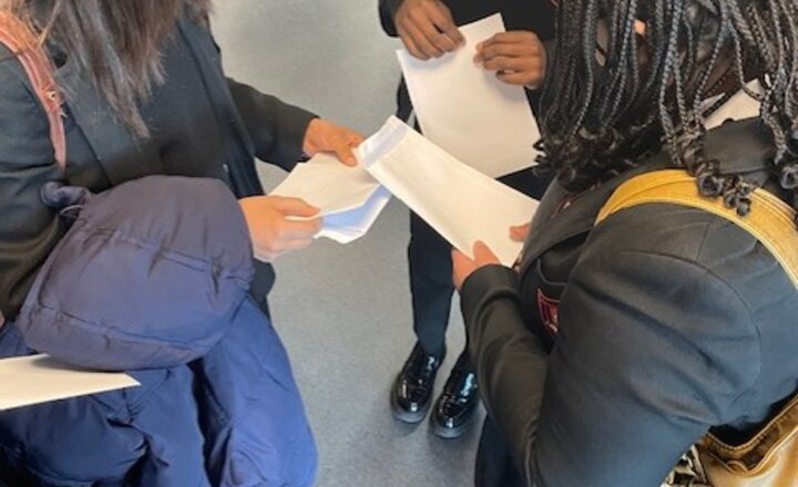 EMS Year 11 students looking at their mock results