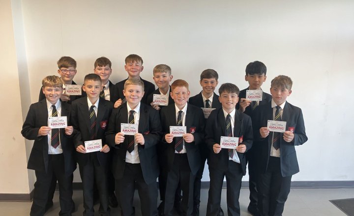 EMS Year 8 Boys Rugby Team with their celebratory cards after three wins from their first competitive matches of the year