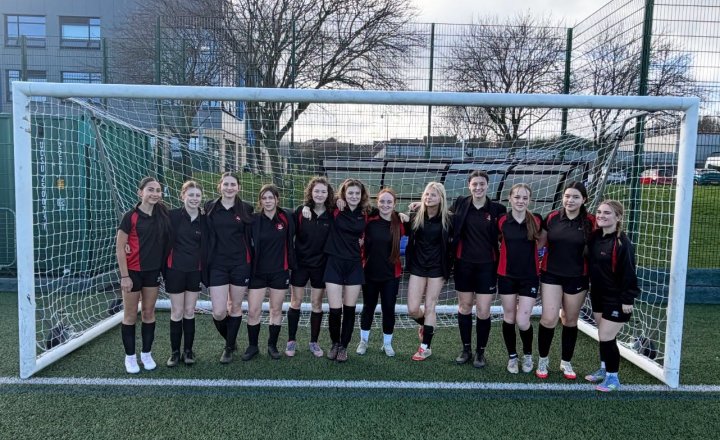 EMS girls' football team together to celebrate their 2025/26 season