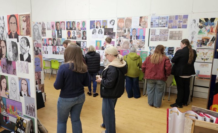 Visitors viewing the works from the talented EMS GCSE art students 