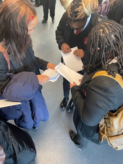EMS Year 11 students looking at their mock results