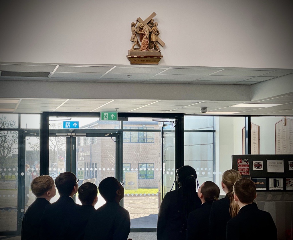 English Martyrs students looking at the Stations of the Cross