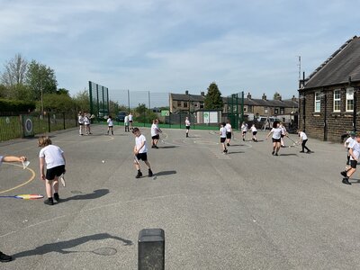 Image of Badminton in the Great Outdoors... Well, the Playground! 