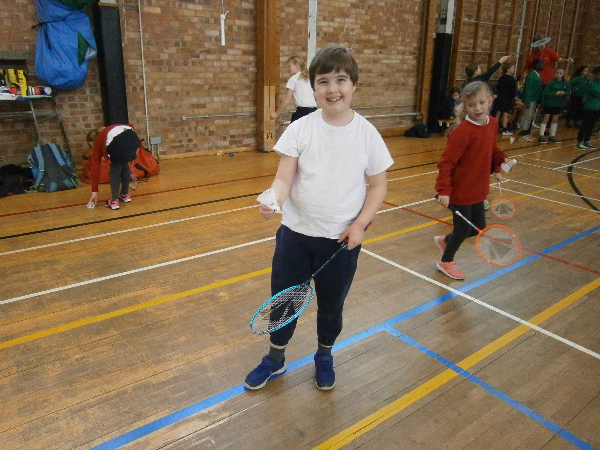 Image of Year 4 children learn badminton skills