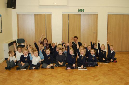 Image of Grimsby Town defender Shaun Pearson visits Year 1