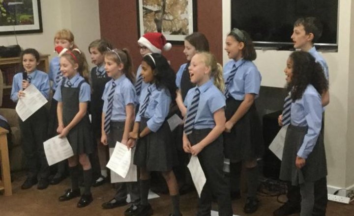 Image of Y4 & Y5 Choir Members Singing At Westvale House Care Home