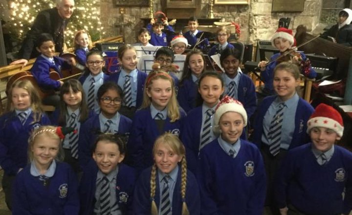 Image of Y6 Choir and Orchestra performing at St. Elphin’s Parish Church