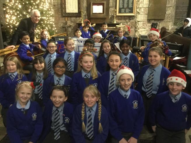 Image of Y6 Choir and Orchestra performing at St. Elphin’s Parish Church