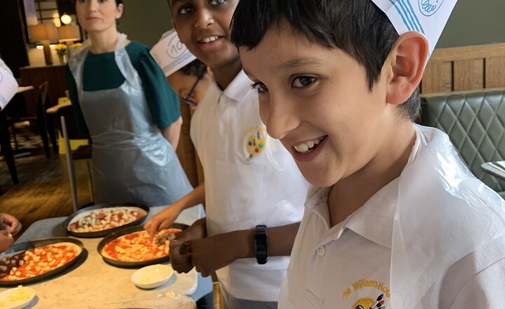 Image of Year six learn about making pizzas at Pizza Express